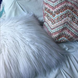 White furry pillow